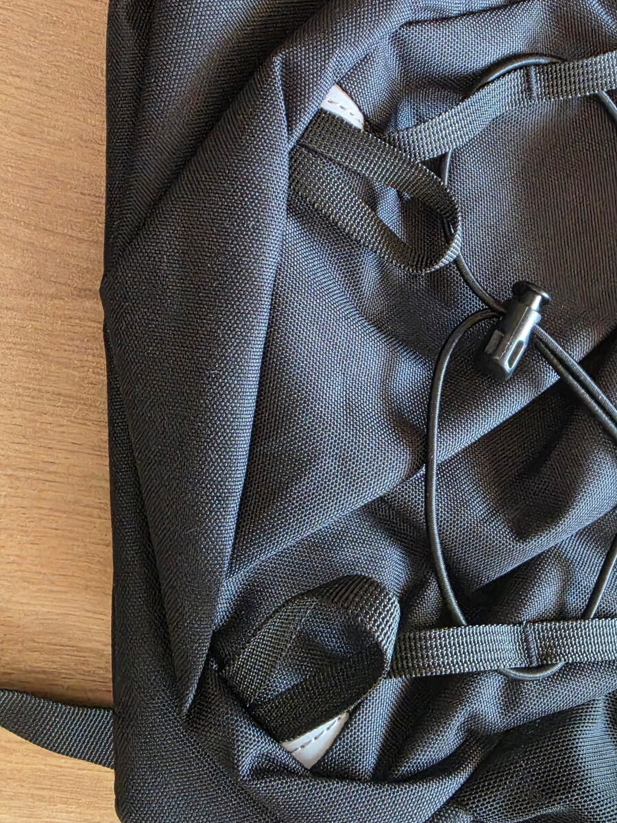 Trekking-pole attachment with a webbing loop, bungee cord and cord lock on the WATERFLY 20L